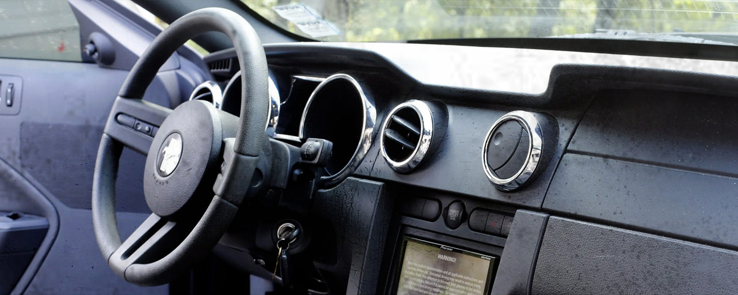 Car Dashboard before using Carrera dashboard cleaner