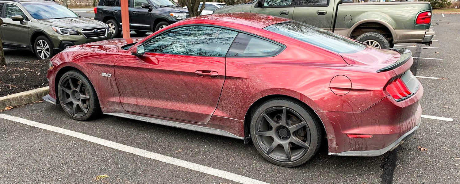 A car having dirt before using car shampoo